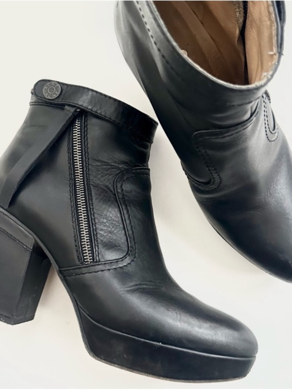 ACNE STUDIOS “TRACK” BLACK LEATHER TABBED PLATFORM BOOTIES WITH EXPOSED ZIPPER